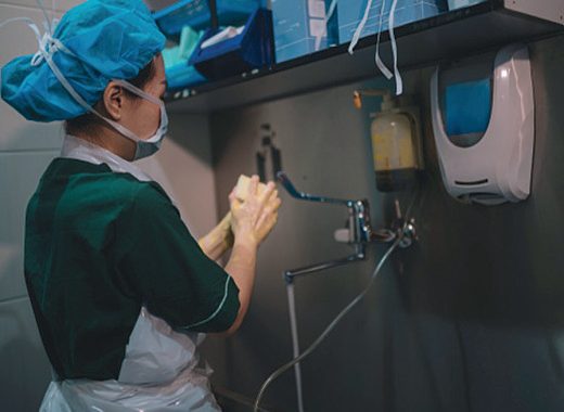 Aseptic technique: surgical scrubbing before draping in a modern operating theatre
